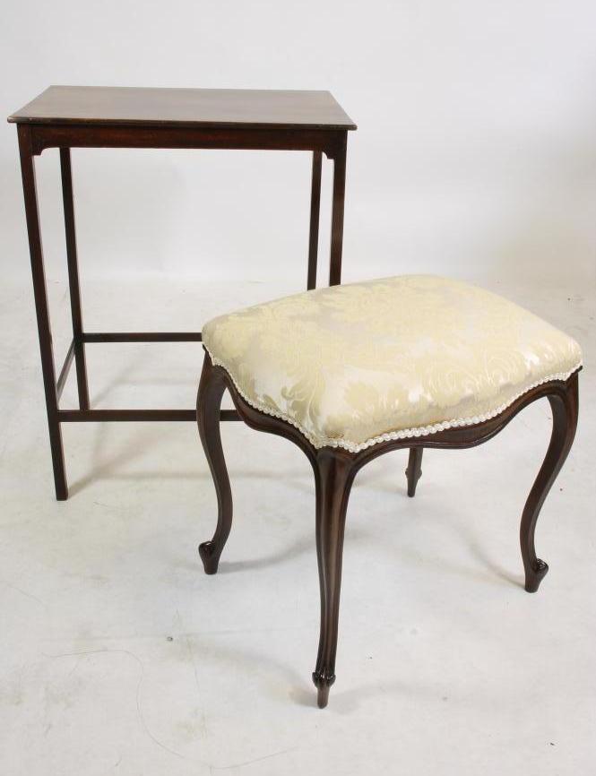 AN EARLY VICTORIAN MAHOGANY STOOL of oblong serpentine form upholstered in ivory damask Image