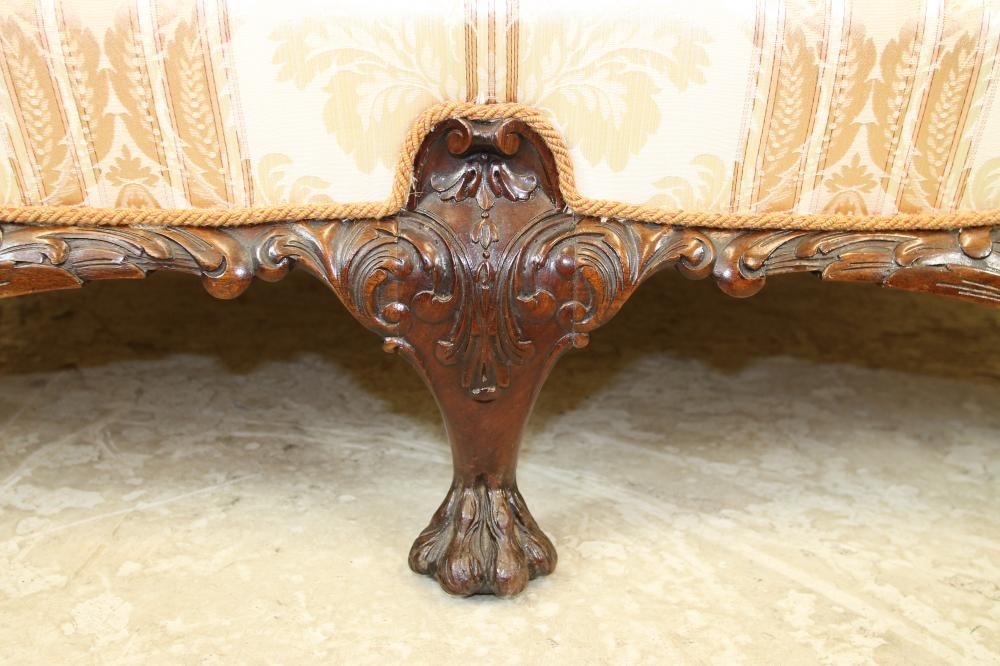 A CARVED WALNUT FRAMED BERGERE SUITE Image