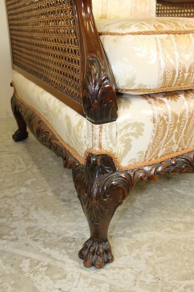 A CARVED WALNUT FRAMED BERGERE SUITE Image