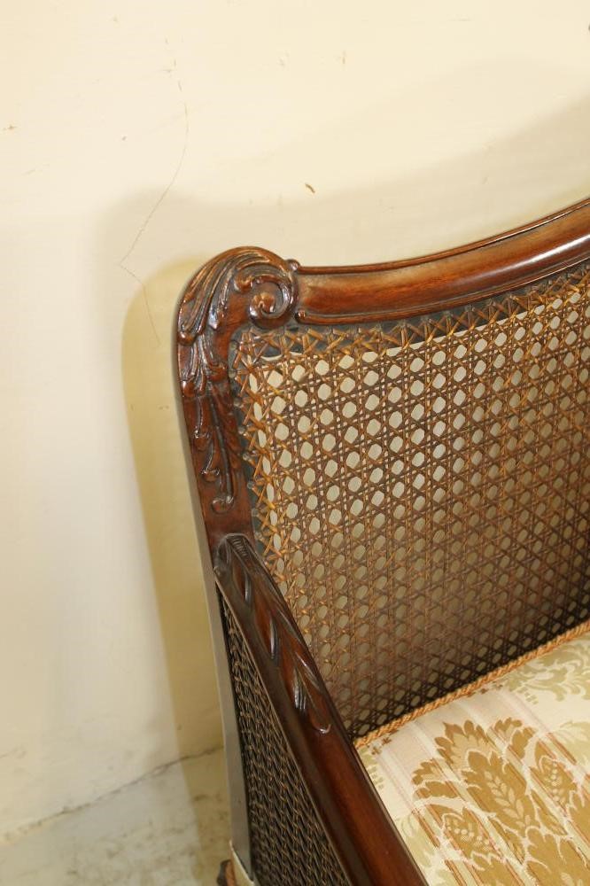 A CARVED WALNUT FRAMED BERGERE SUITE Image