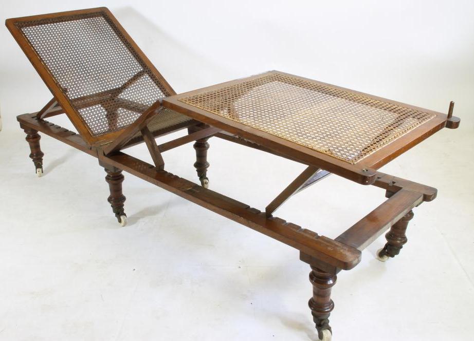 A VICTORIAN CARVED MAHOGANY ADJUSTABLE CAMPAIGN BED by Leveson (Manchester) Image