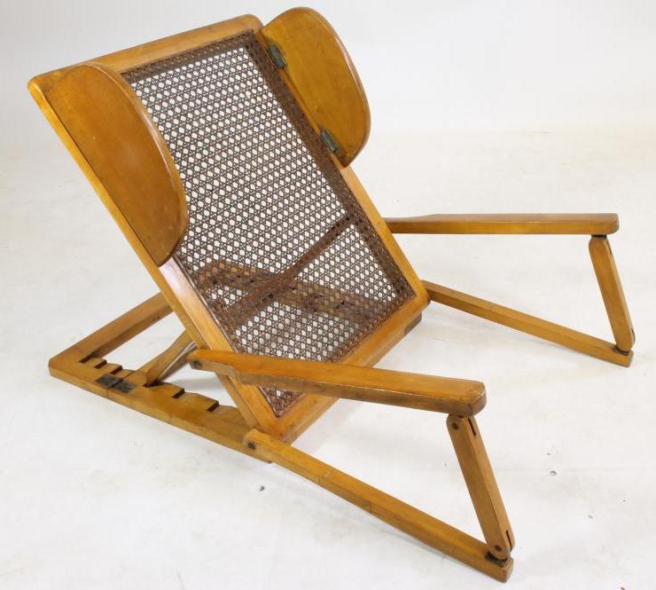 A CANED SATINWOOD CAMPAIGN FOLDING BACKREST by Leveson & Sons Image