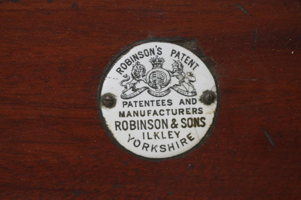 A MAHOGANY ADJUSTABLE CAMPAIGN BED by Robinson & Sons Image
