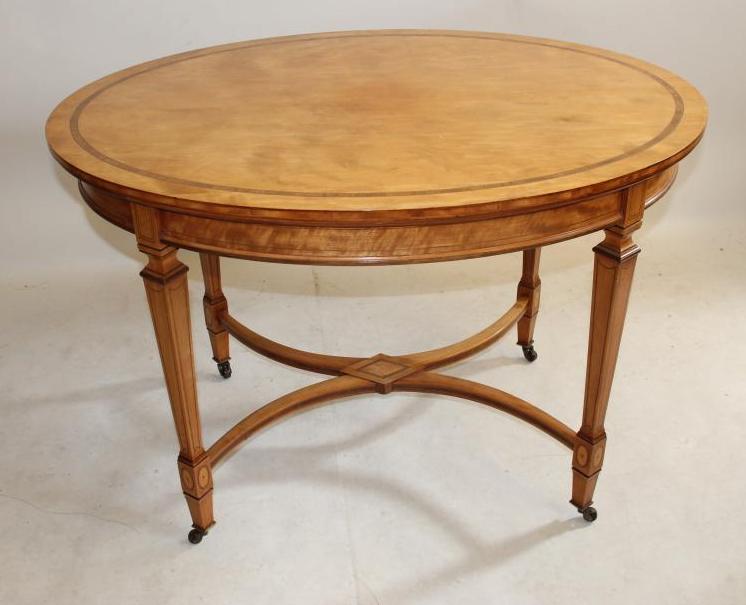 AN EDWARDIAN SATINWOOD OCCASIONAL TABLE by H Ogden Image