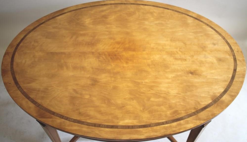 AN EDWARDIAN SATINWOOD OCCASIONAL TABLE by H Ogden Image