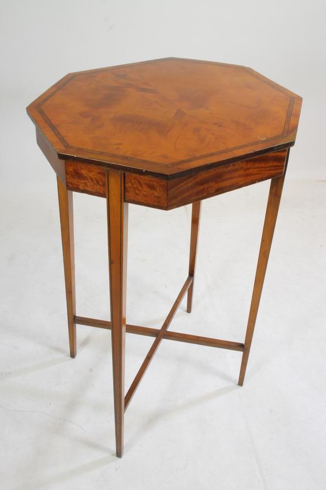 AN EDWARDIAN SATINWOOD LAMP TABLE of canted oblong form crossbanded with ebony and boxwood stringing Image