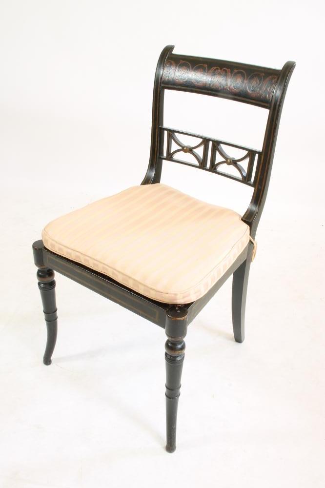 A REGENCY EBONISED AND PARCEL GILT SIDE CHAIR Image