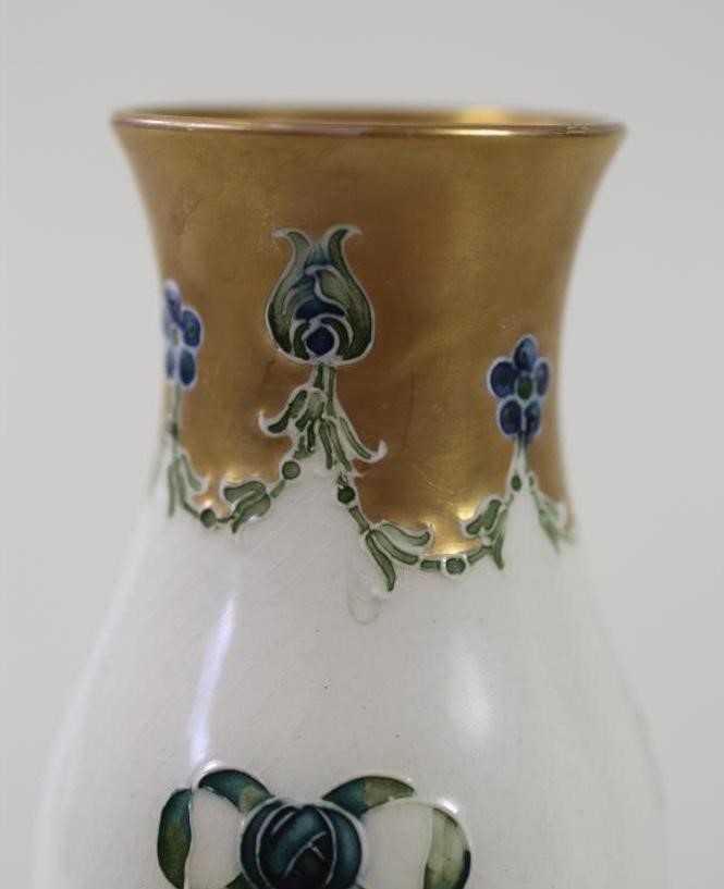 A PAIR OF MACINTYRE MOORCROFT POTTERY "EIGHTEENTH CENTURY" PATTERN VASES Image