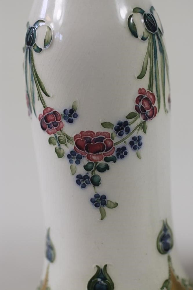 A PAIR OF MACINTYRE MOORCROFT POTTERY "EIGHTEENTH CENTURY" PATTERN VASES Image