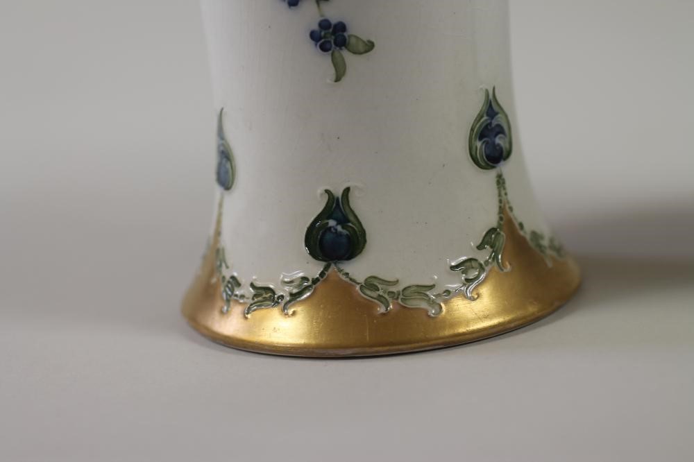 A PAIR OF MACINTYRE MOORCROFT POTTERY "EIGHTEENTH CENTURY" PATTERN VASES Image