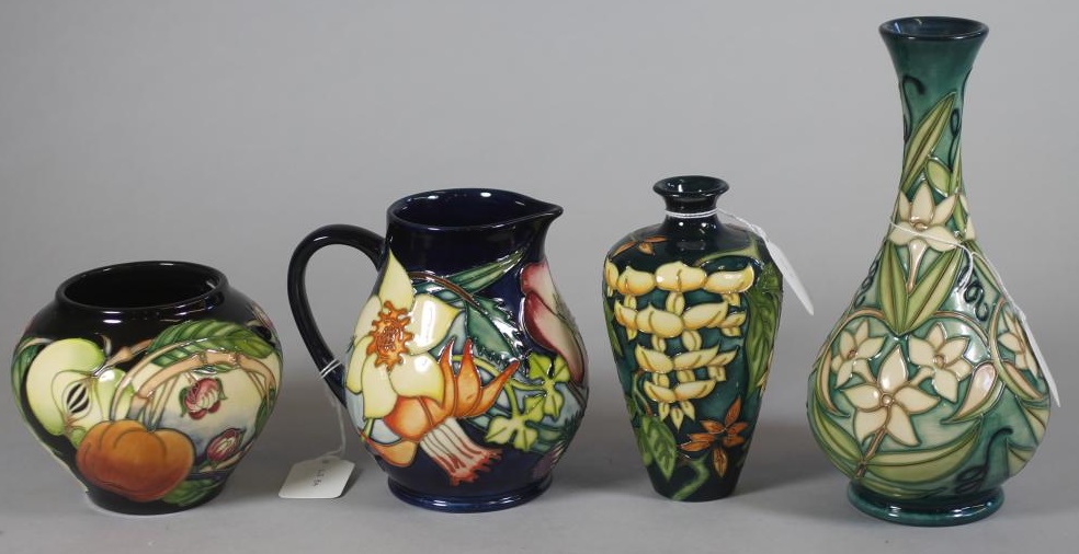 A COLLECTION OF MOORCROFT POTTERY Image