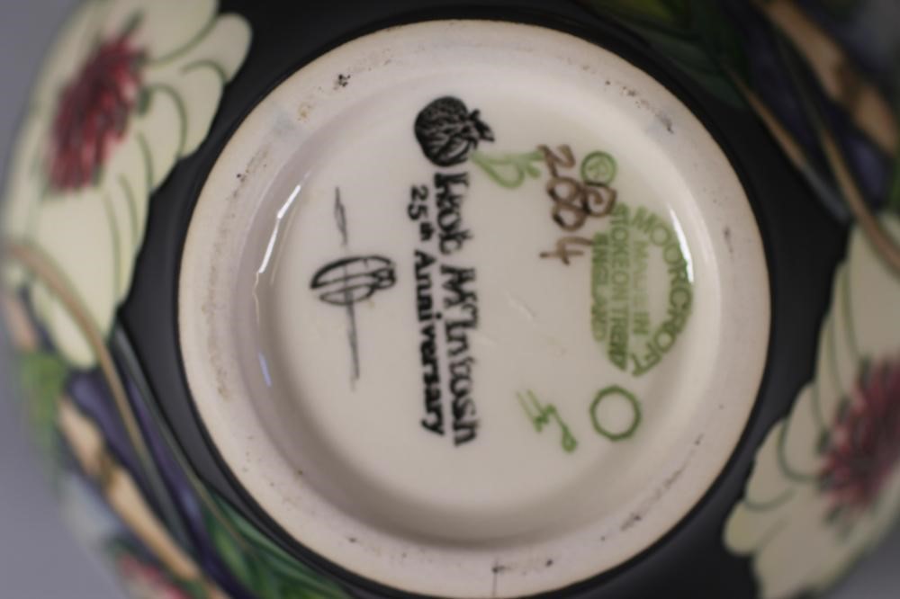 A COLLECTION OF MOORCROFT POTTERY Image