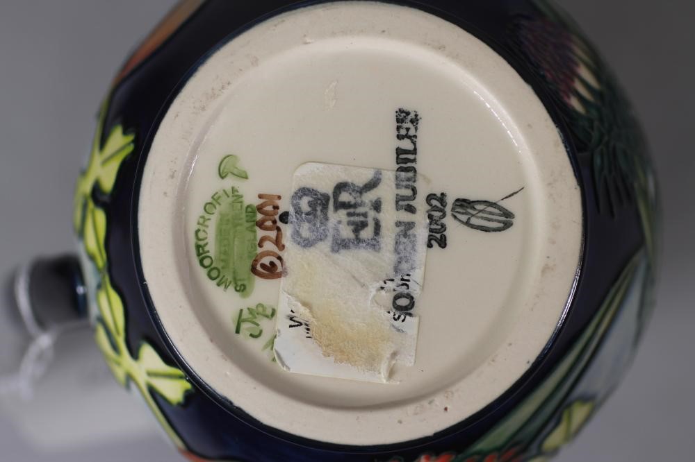 A COLLECTION OF MOORCROFT POTTERY Image