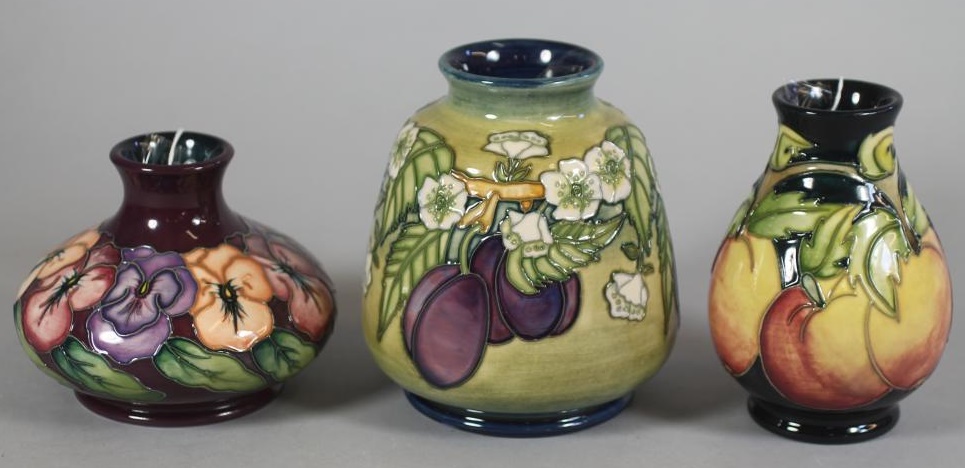 TWO MOORCROFT POTTERY TRAINING VASES Image