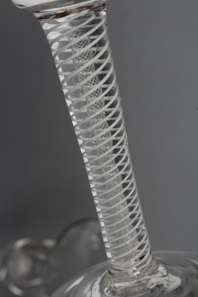 A PAIR OF WINE GLASSES Image