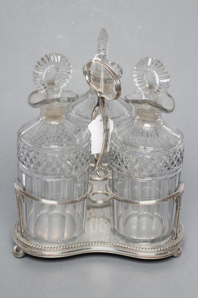 AN OLD SHEFFIELD PLATE TRIPLE DECANTER STAND Image