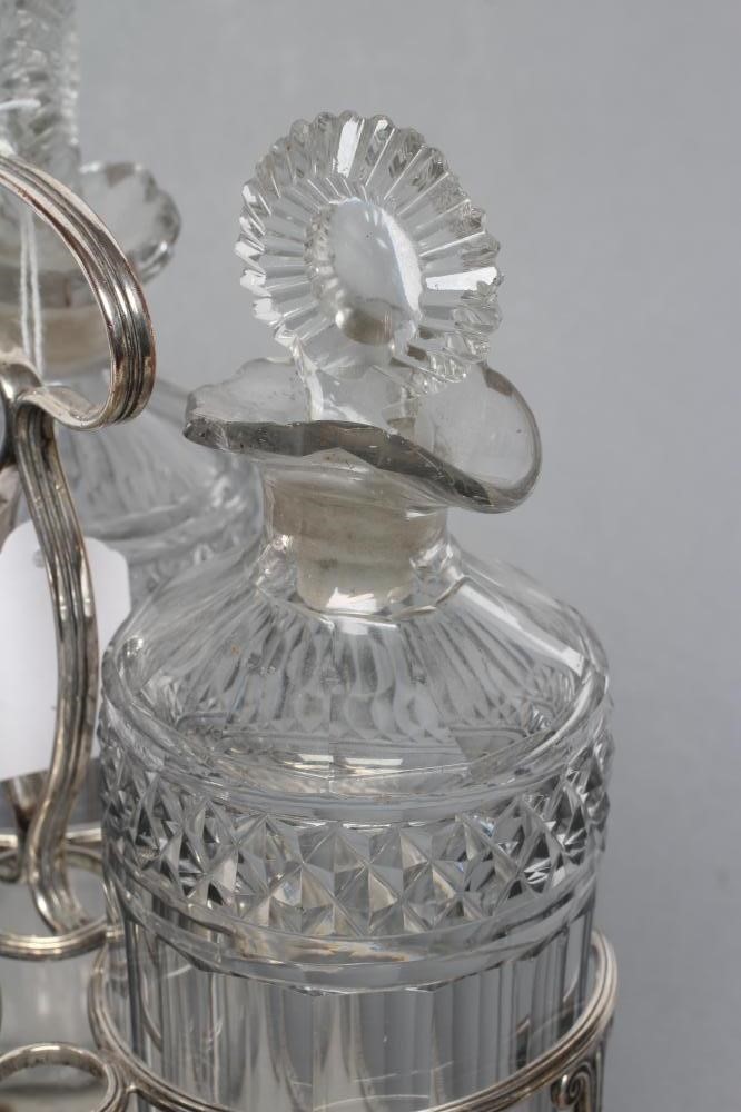 AN OLD SHEFFIELD PLATE TRIPLE DECANTER STAND Image
