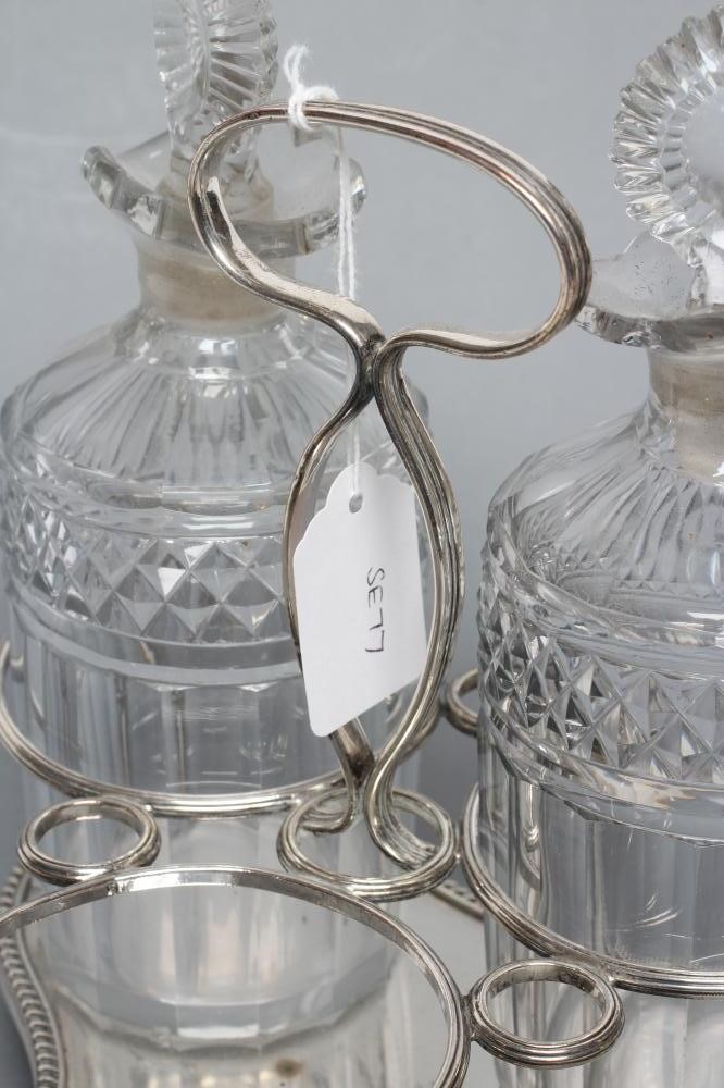 AN OLD SHEFFIELD PLATE TRIPLE DECANTER STAND Image