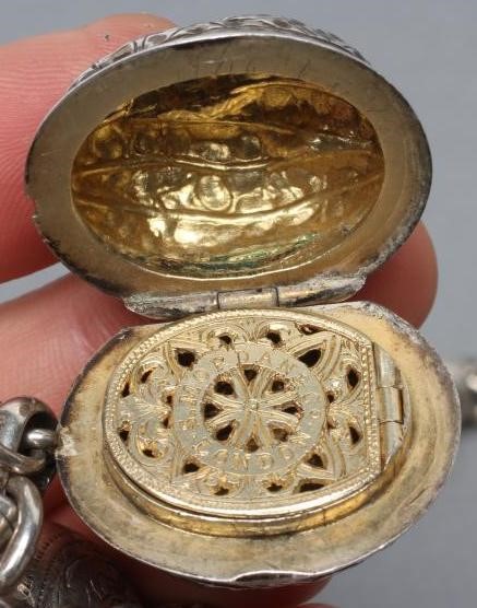 A LATE VICTORIAN SILVER CHATELAINE Image