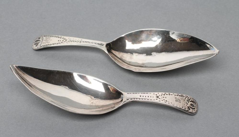 A PAIR OF GEORGE III SILVER CADDY SPOONS Image