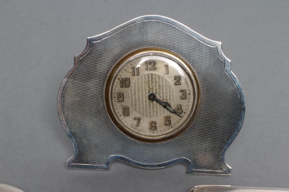 AN ART DECO SILVER CIGARETTE CASE Image