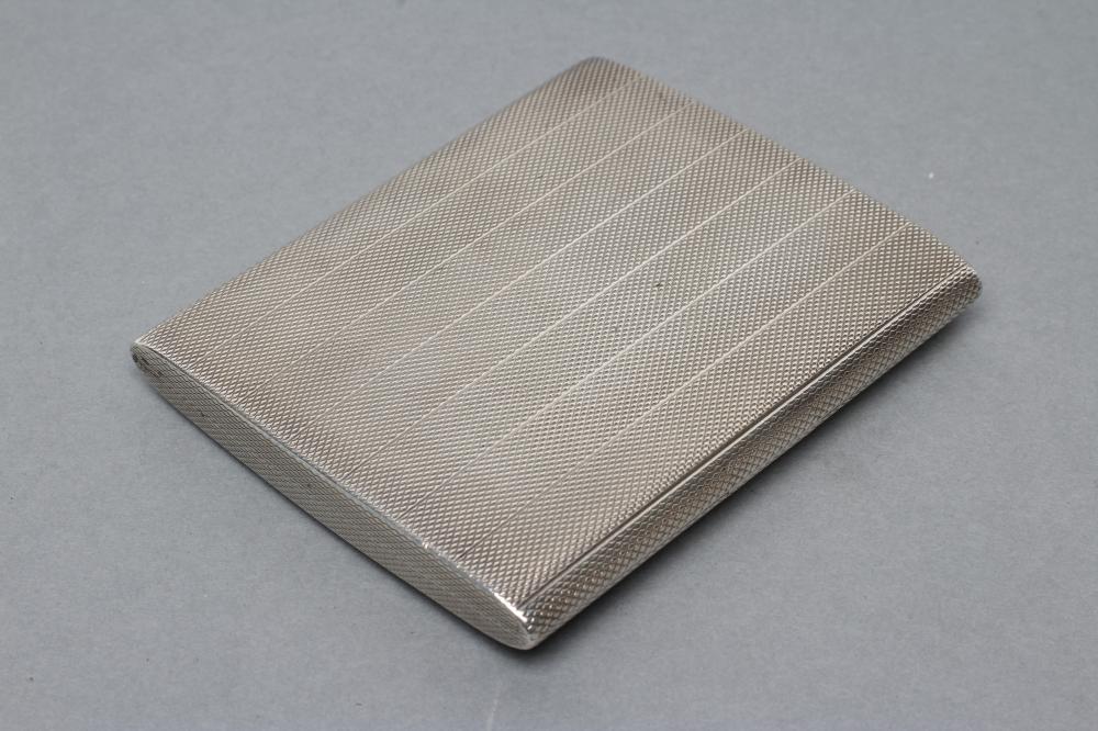 AN ART DECO SILVER CIGARETTE CASE Image