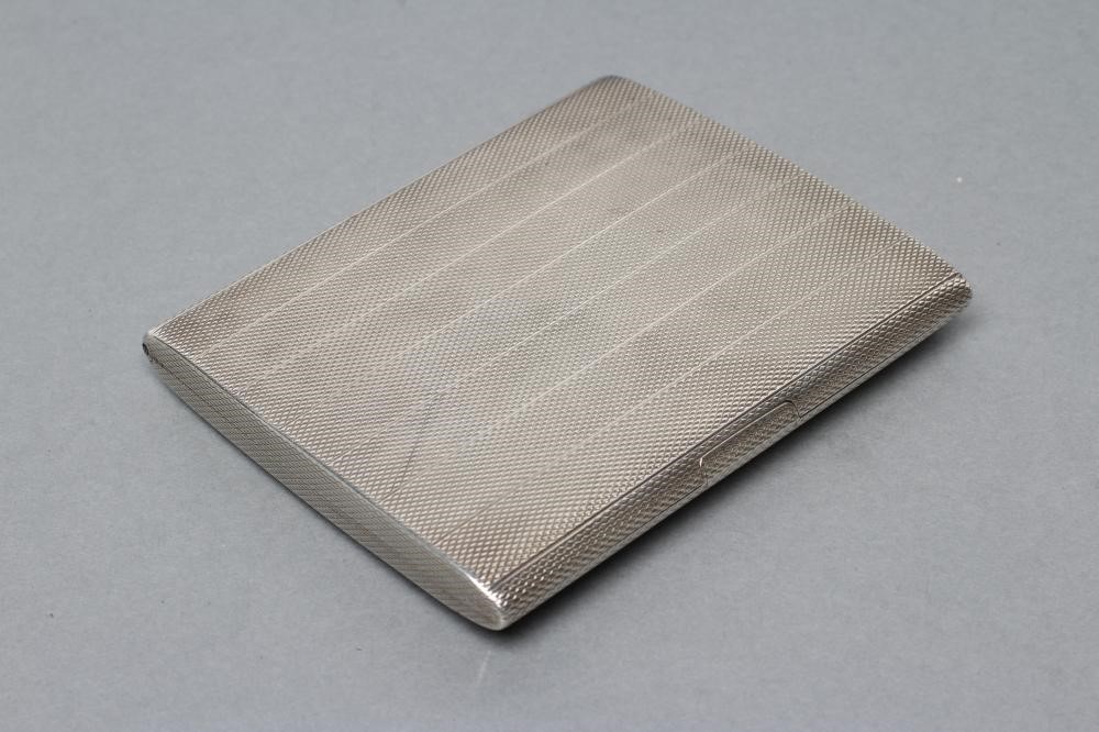 AN ART DECO SILVER CIGARETTE CASE Image