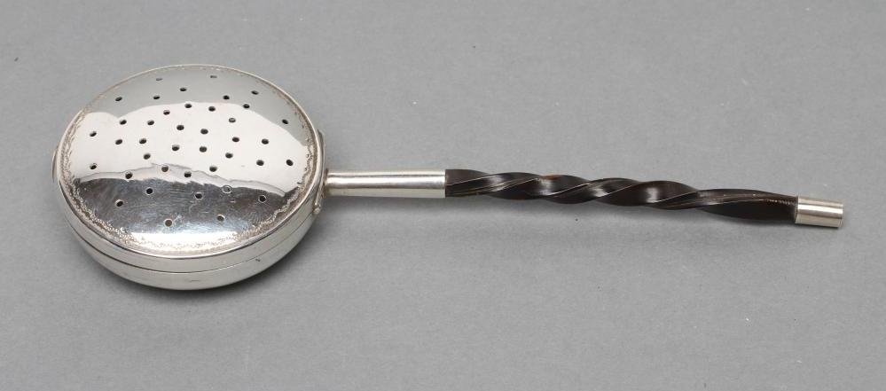 AN EARLY VICTORIAN SILVER NOVELTY TEA INFUSER Image