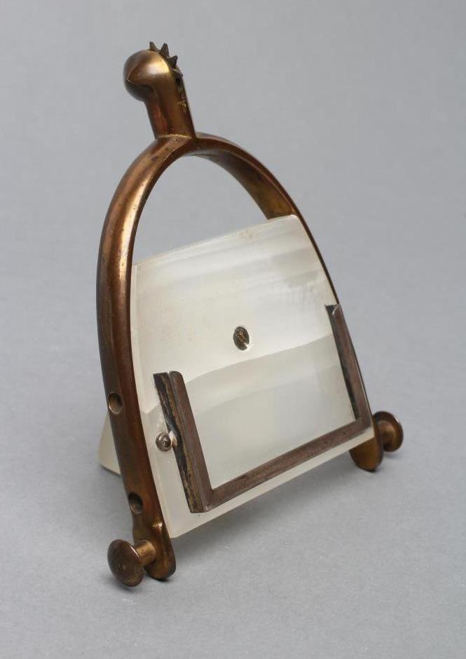 AN ART DECO WHITE ONYX PERPETUAL CALENDAR Image