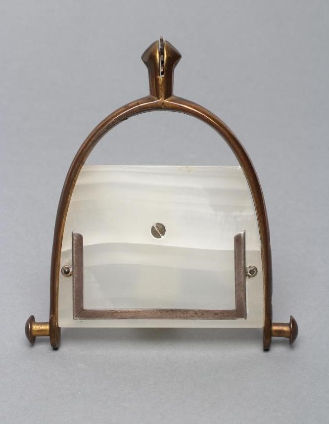 AN ART DECO WHITE ONYX PERPETUAL CALENDAR Image