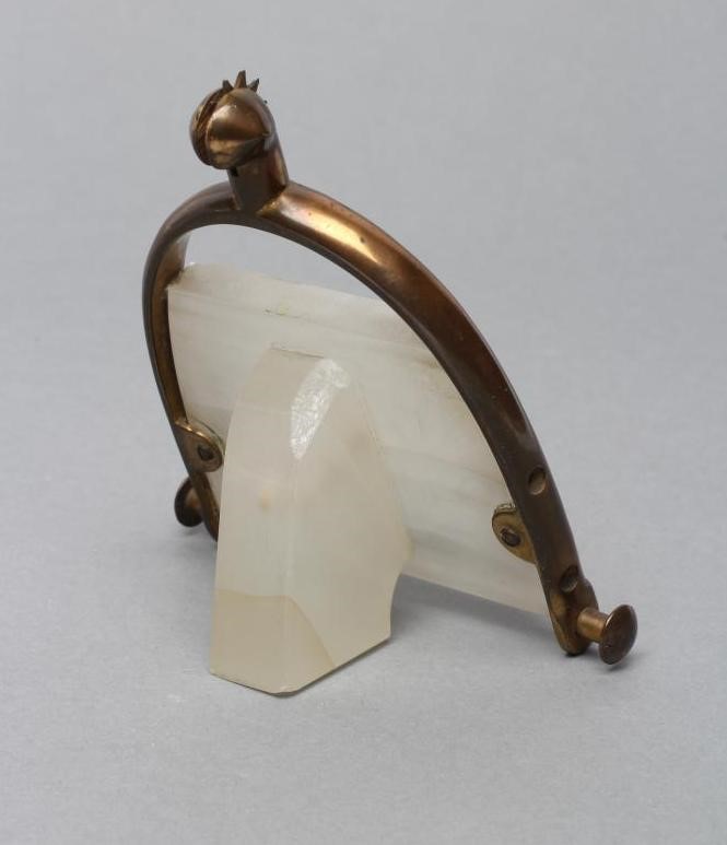 AN ART DECO WHITE ONYX PERPETUAL CALENDAR Image