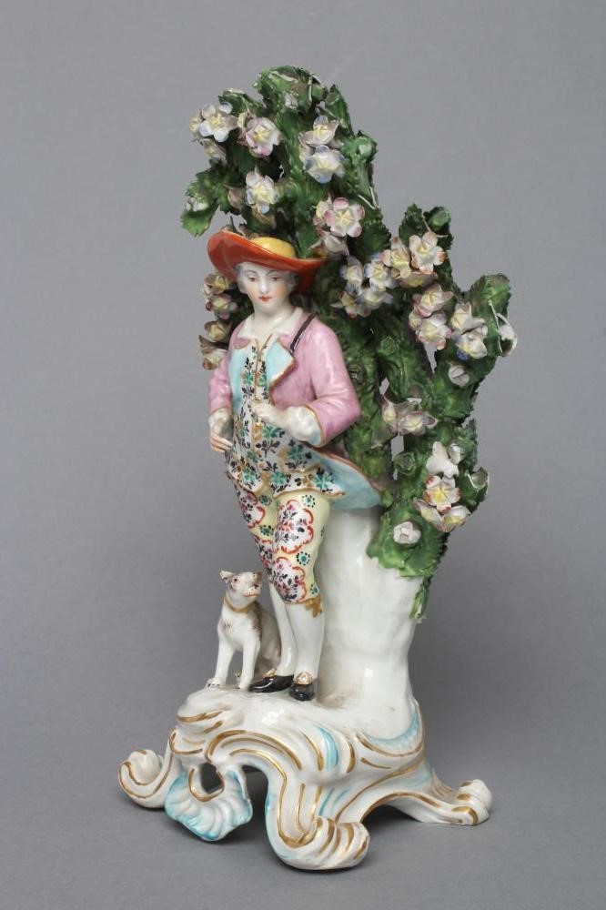 A CHELSEA PORCELAIN FIGURE Image