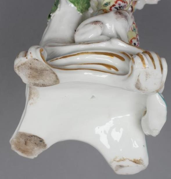A CHELSEA PORCELAIN FIGURE Image