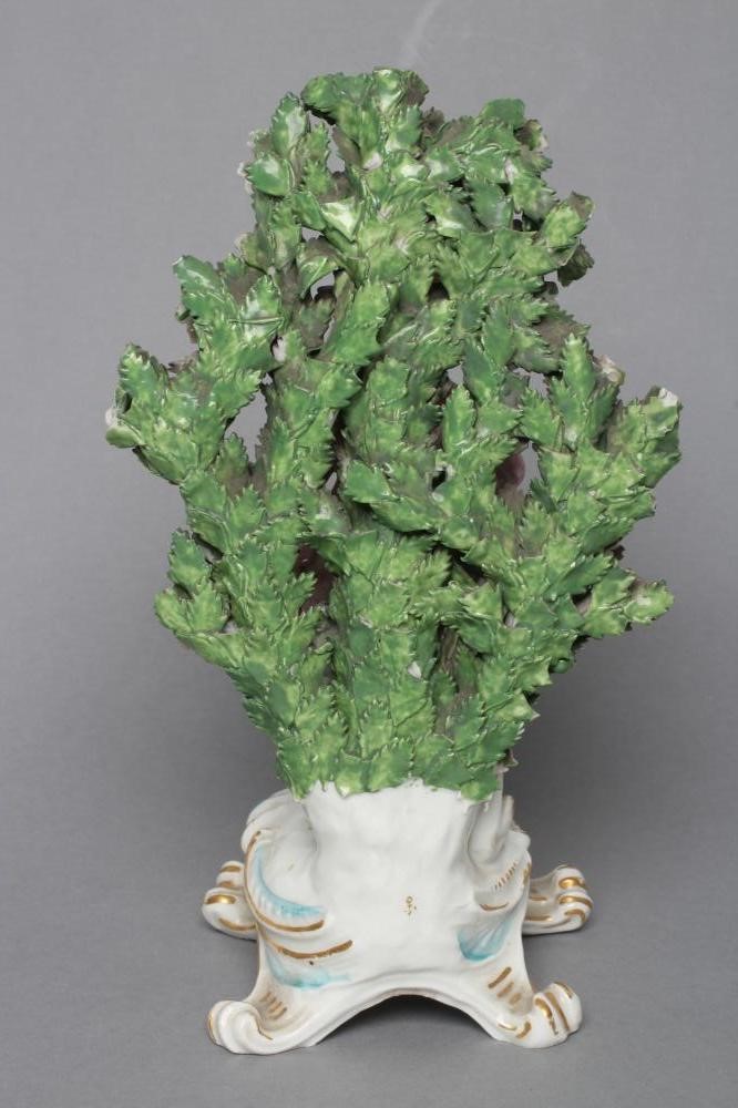 A CHELSEA PORCELAIN FIGURE Image