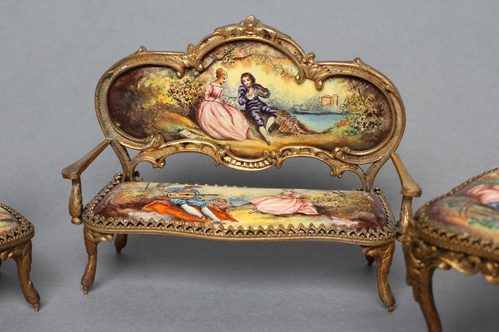 AN AUSTRIAN GILT METAL AND ENAMEL MINIATURE BOUDOIR SET Image