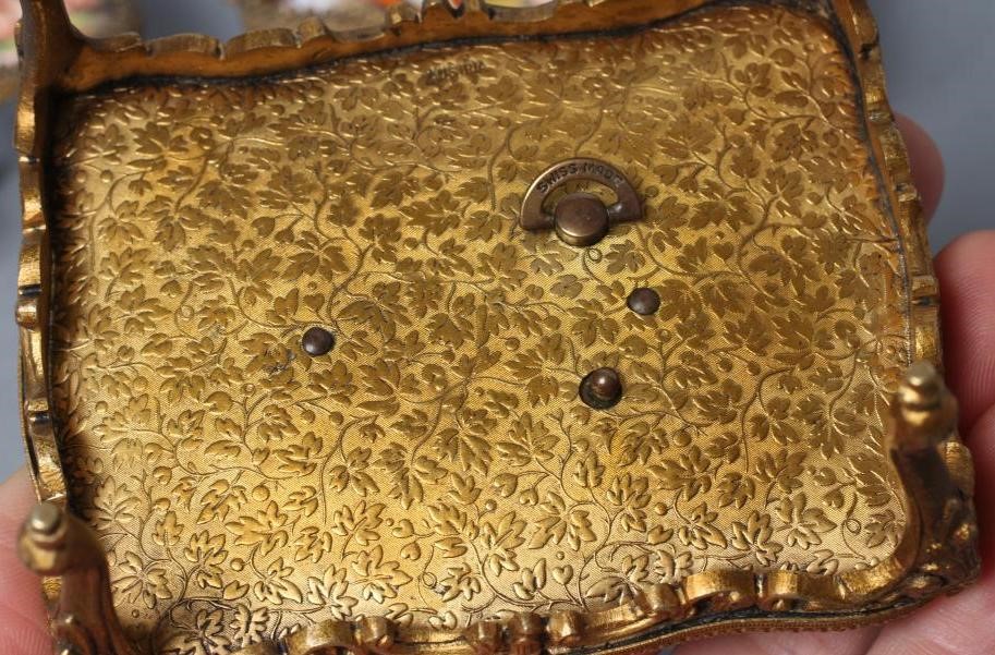 AN AUSTRIAN GILT METAL AND ENAMEL MINIATURE BOUDOIR SET Image