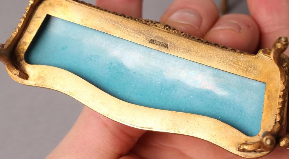 AN AUSTRIAN GILT METAL AND ENAMEL MINIATURE BOUDOIR SET Image