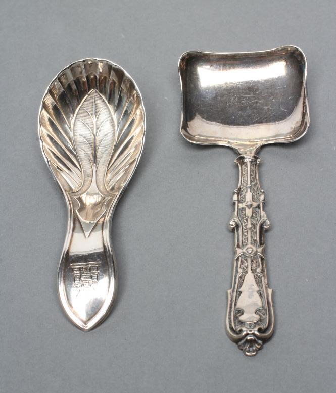 A GEORGE III SILVER CADDY SPOON Image