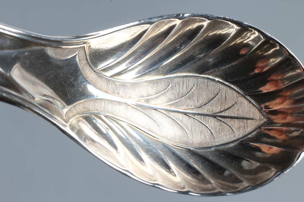 A GEORGE III SILVER CADDY SPOON Image