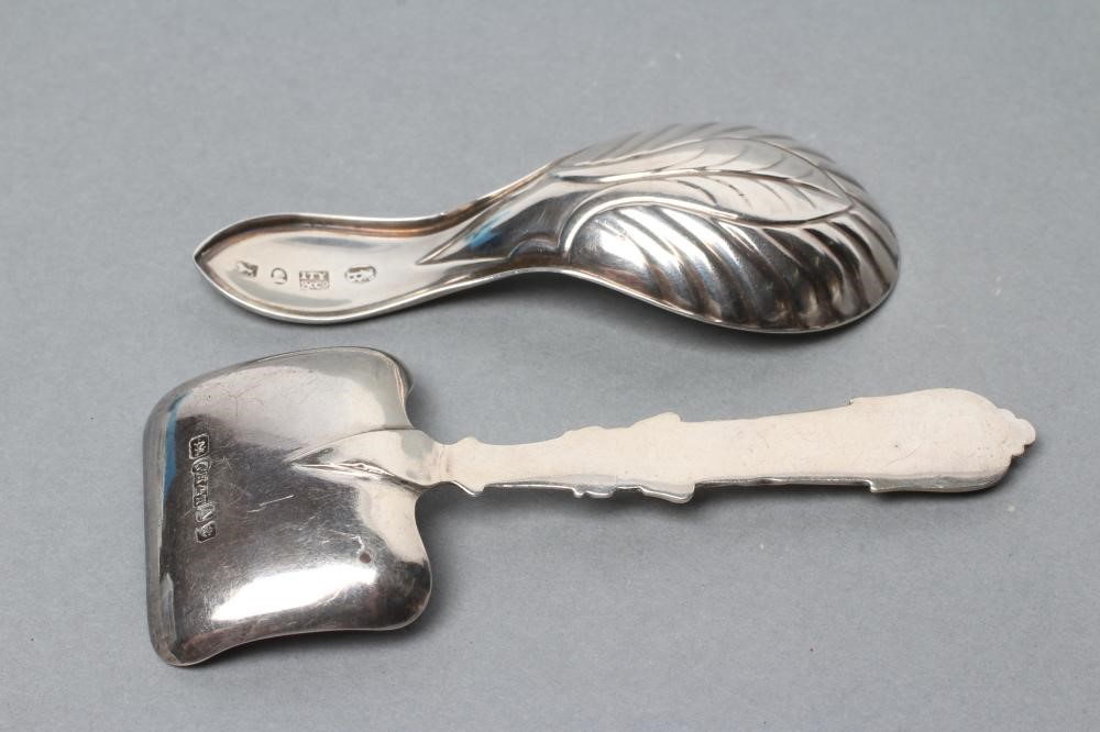 A GEORGE III SILVER CADDY SPOON Image