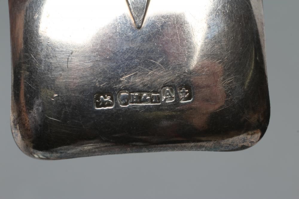 A GEORGE III SILVER CADDY SPOON Image