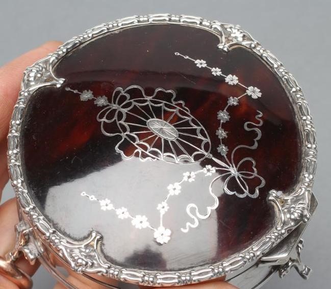 A SILVER AND TORTOISESHELL DRESSING TABLE BOX Image