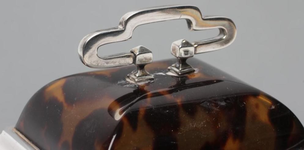 A SILVER MOUNTED TORTOISESHELL CARRIAGE CLOCK Image