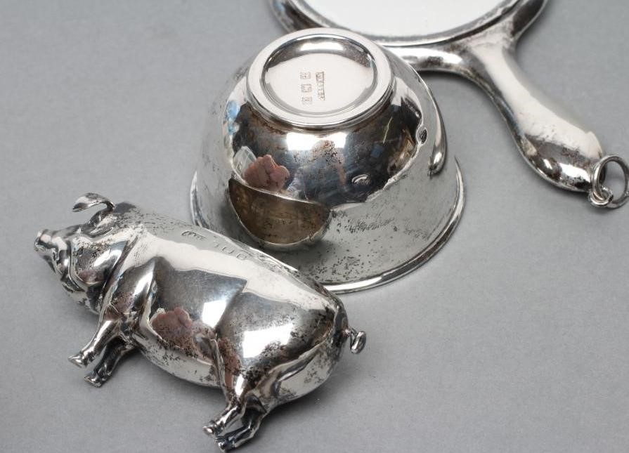 A NOVELTY SILVER PIN CUSHION Image