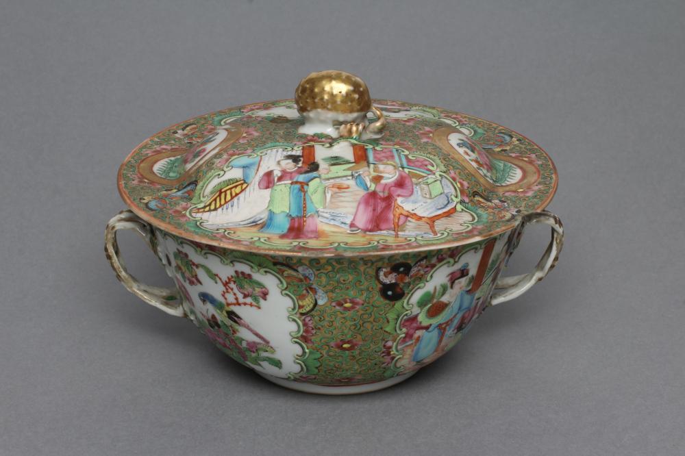 A CANTONESE PORCELAIN ECUELLE AND COVER of circular form with two entwined handles Image