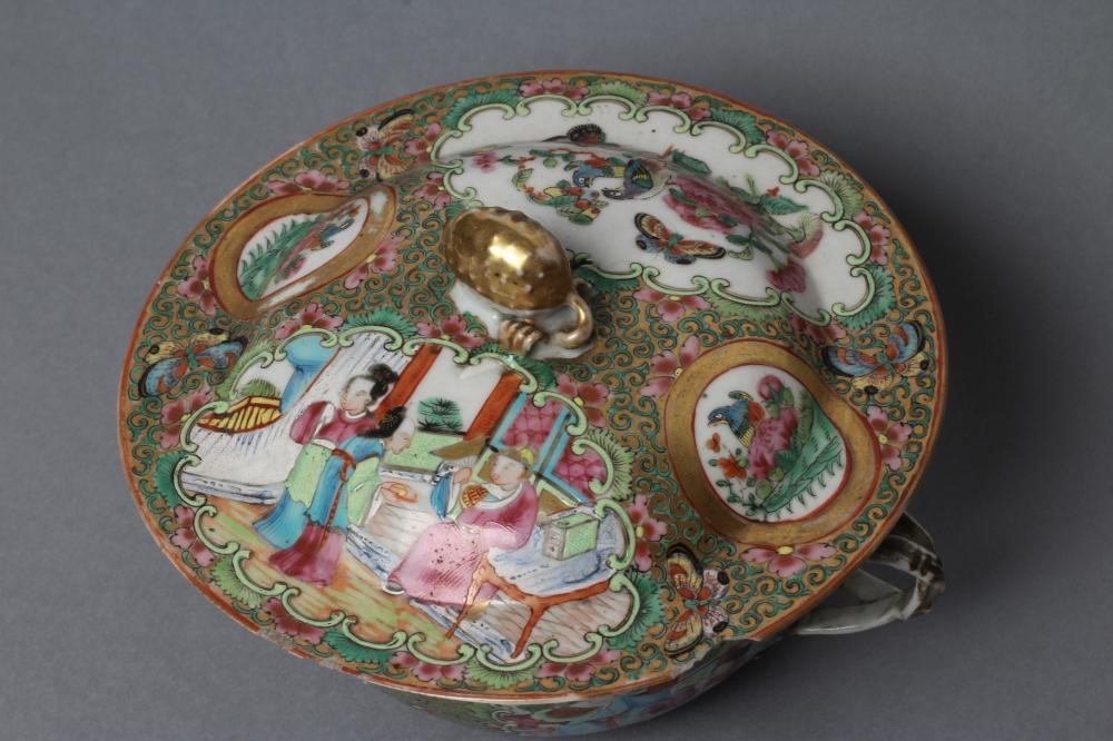 A CANTONESE PORCELAIN ECUELLE AND COVER of circular form with two entwined handles Image