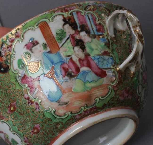 A CANTONESE PORCELAIN ECUELLE AND COVER of circular form with two entwined handles Image