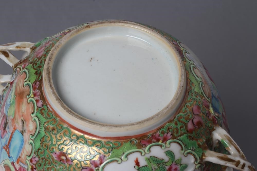 A CANTONESE PORCELAIN ECUELLE AND COVER of circular form with two entwined handles Image