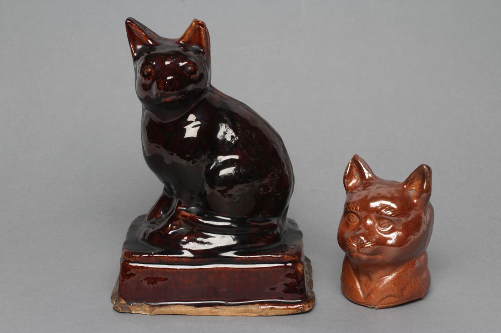 AN ENGLISH TREACLE GLAZED STONEWARE CAT Image