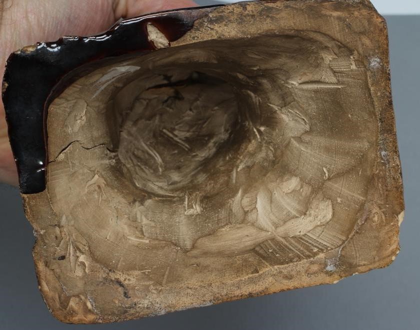 AN ENGLISH TREACLE GLAZED STONEWARE CAT Image